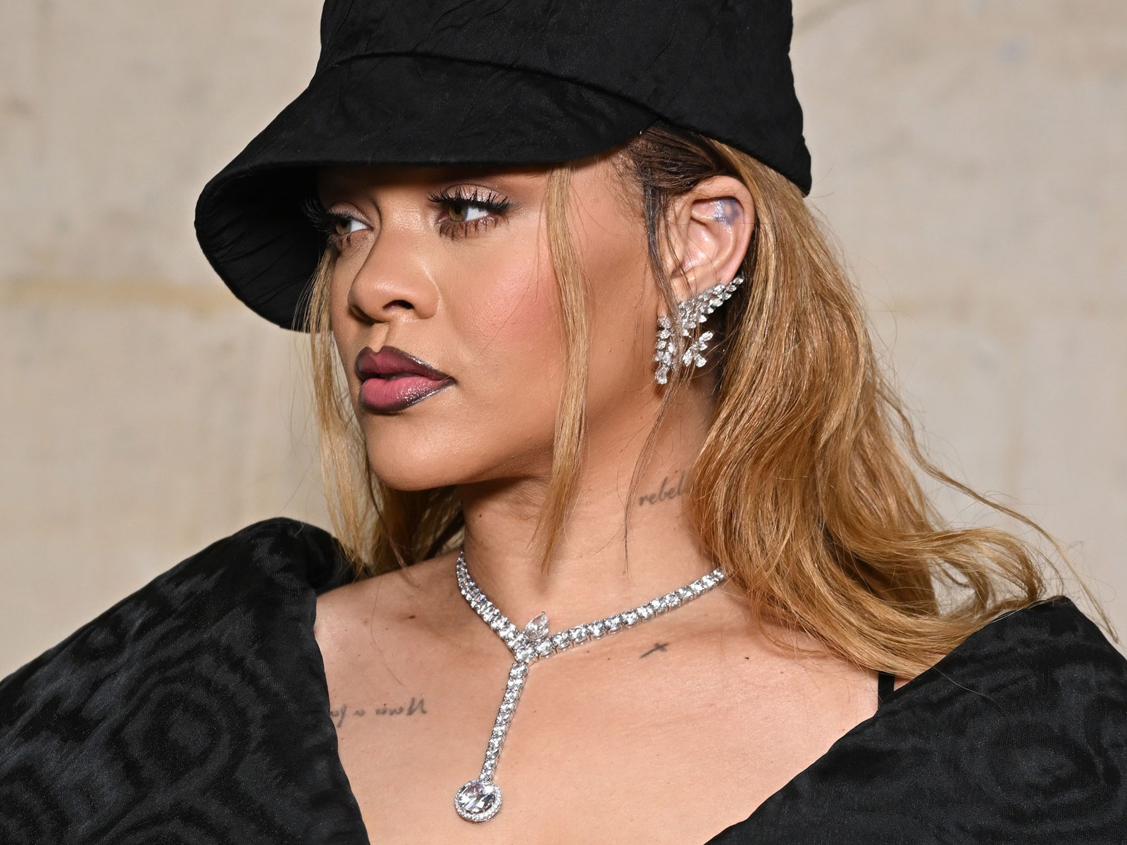 Rihanna's new blonde ‘waterfall’ bangs are giving us flashbacks